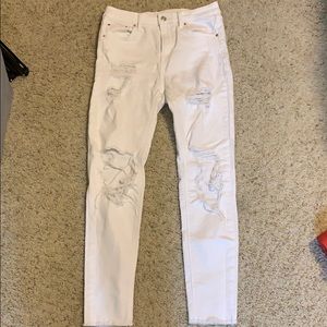 White ripped jeans with frayed bottom